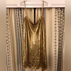 NWT. Free People gold sequin mini dress.